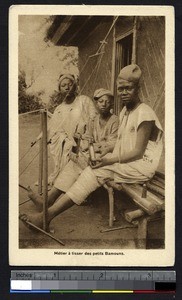 Boys at a weaving loom, Cameroon, ca.1920-1940