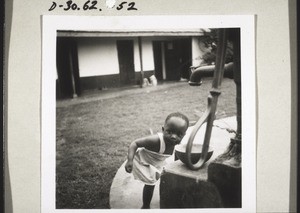 African child fetching water