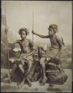 (Two children with speers / studio photograph)