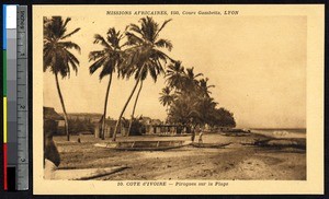 Empty boats on the shore, Ivory Coast, ca.1900-1930