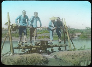 Men operating treadwheel irrigation, China, ca.1917-1923