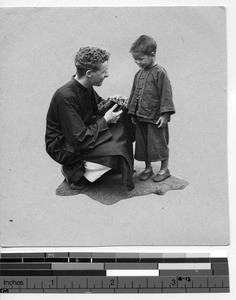 Fr. Dempsey and Chinese boy at Wuzhou, China, 1933