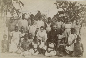 Missionaries with their pupils