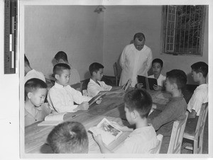 Fr. Paulhus conducting a class at Jiangmen, China, 1947