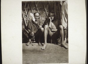 A man spinning in Bali, with his friend