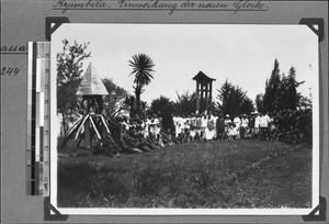 Congregation in front of belfries, Kyimbila, Tanzania