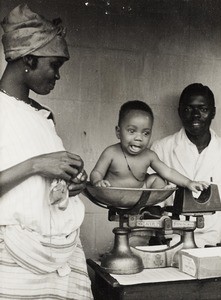 Baby at weight testing, Ama Achara, Nigeria, ca. 1938