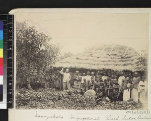 Missionary and congregation outside church, Manyakala, Quilon, India, ca. 1900-1910