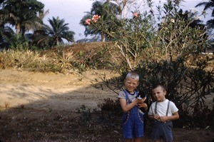 Arne and Olav Heggheim with their cat, Bankim, Adamaoua, Cameroon, 1955-1962