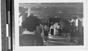 Catholic Mass in the Japanese Relocation Camp chapel, Manzanar, California, ca. 1942