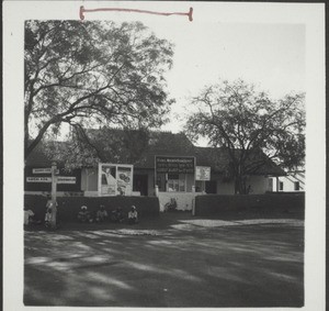 Branch in Hubli, February 1938. The old shop is opposite a bus station, but