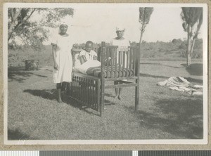 Young patient demonstrates cot, Chogoria, Kenya, ca.1949