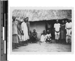 Family visit in the courtyard, East Africa