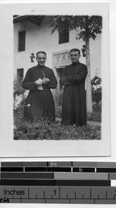 Two Maryknoll priests meet in Hingning, Meixien, China, 1947