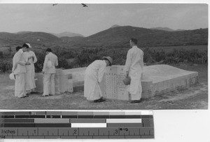 Visiting graves at Yangjiang, China, 1934