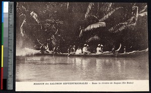 Boating down the Gagan river on Buka Island, Papua New Guinea, ca.1900-1930