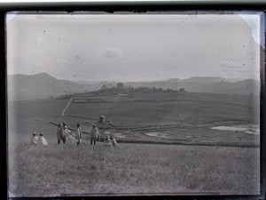 Carriers on the rice fields and Fisakana in the background, Fandriana, Madagascar, ca.1893