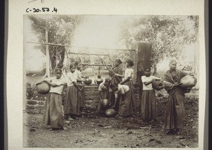 Girls from the boarding school in Mulki fetching water