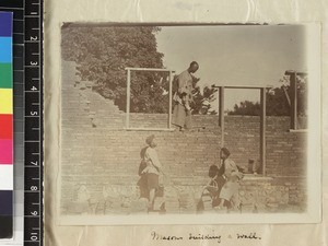 Chinese masons building the wall of a house, Fujian province, China, ca. 1888-1906