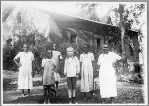 Arnold Blumer and five African girls, Arusha, Tanzania, ca. 1925-1926