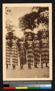 Six female confirmands standing outdoors, Congo, ca.1920-1940