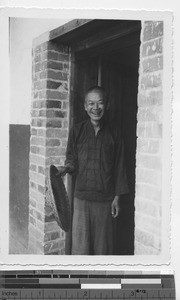 A man standing in doorway at Dubang, China, 1934