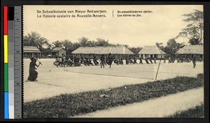 Children playing tug-of-war in a school courtyard, Congo, ca.1920-1940