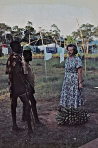 Nurse Ellen Margrethe Christensen, here buying bananas from local people. She served as mission