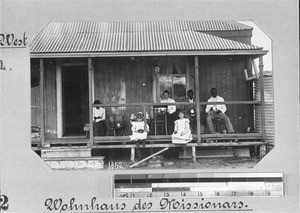 People in front of a missionary's house, South Africa