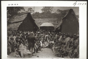 Open air preaching before a chief