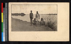 Four young children on a riverbank, Congo, ca.1926