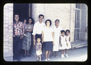 Family outside their home