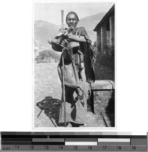 Sorcerer in Nyassa with his tools, East Africa, 1935