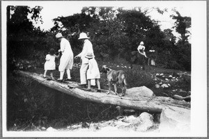 Missionary Pätzig and his family on a simple bridge, Arusha, Tanzania