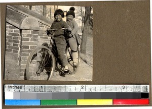 Bicycling to school, China, ca.1931-1934