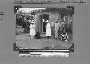 Lepers with medical staff, Isoko, Tanzania, 1929