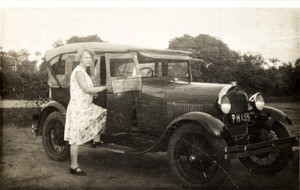 Female missionary getting into car, Nigeria, ca. 1933