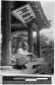 Man with musical instrument, Peng Yang, Korea, ca. 1920-1940