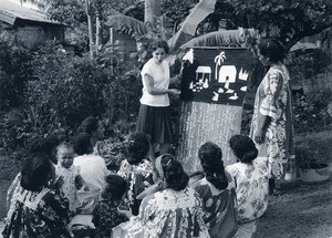 Missionary Miss Bru using a flannelgraph to teaching women