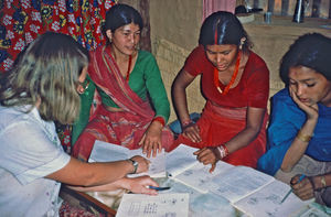 United Mission to Nepal. DSM/UMN Missionary Tove Madsen teaching village women at Namjung, Gorh