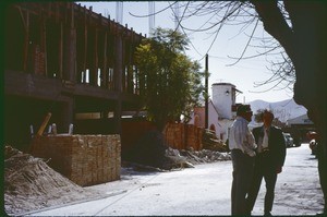 Two men at a construction site