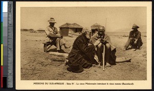 Missionary father evangelizes an indigenous man, Lesotho, ca.1900-1930