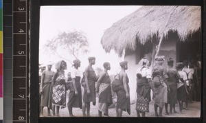 Mothers and babies going to church, Benin, ca. 1925-26