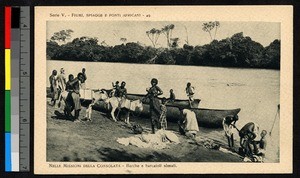 People gathering on the shore with boats and donkeys, Somalia, ca.1920-1940