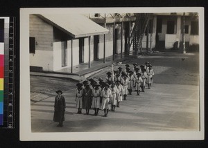 Girl Guides in formation outdoors, Ghana, 1926