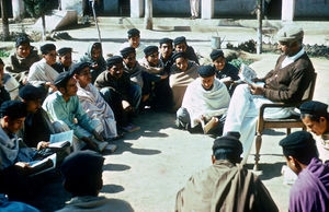 Pakistan, NWFP. A group of local Christians assembled for a teaching session/Bible study at Pes