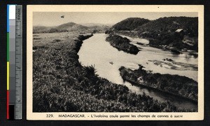 The Ivololina River passing through sugar cane fields, Madagascar, ca.1920-1940