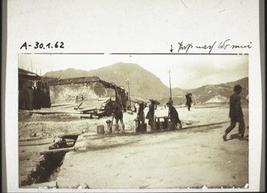 Fetching water from the taps on the water mains near Kowloon, at the jetty 1909