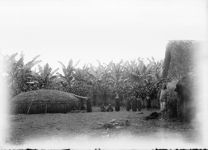 Askari in an African homestead, Tanzania, ca.1893-1920