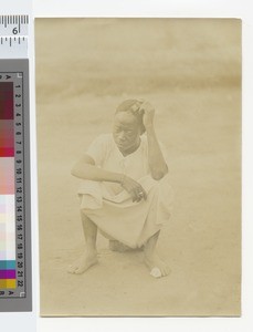 Boy combing his hair, Malawi, ca.1910